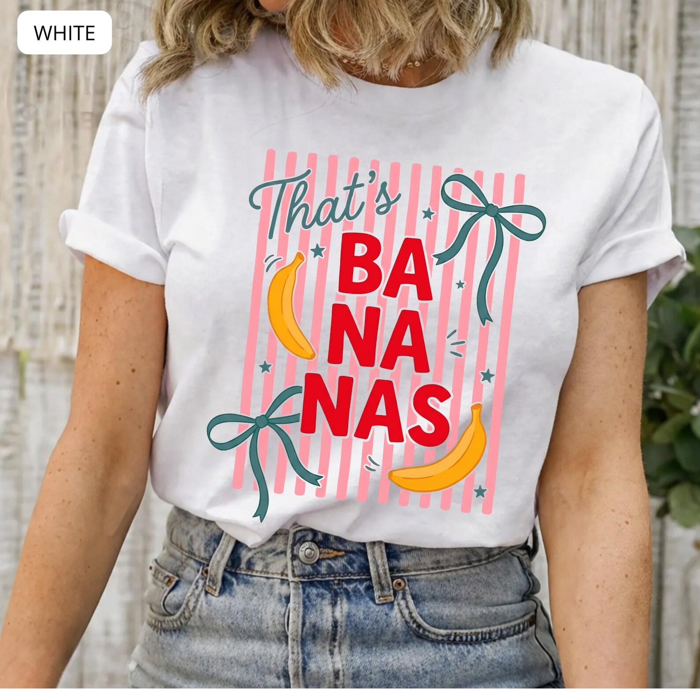 Close-up view of Comfort Colors 'That's Bananas' graphic tee featuring vibrant bananas and colorful striped design.