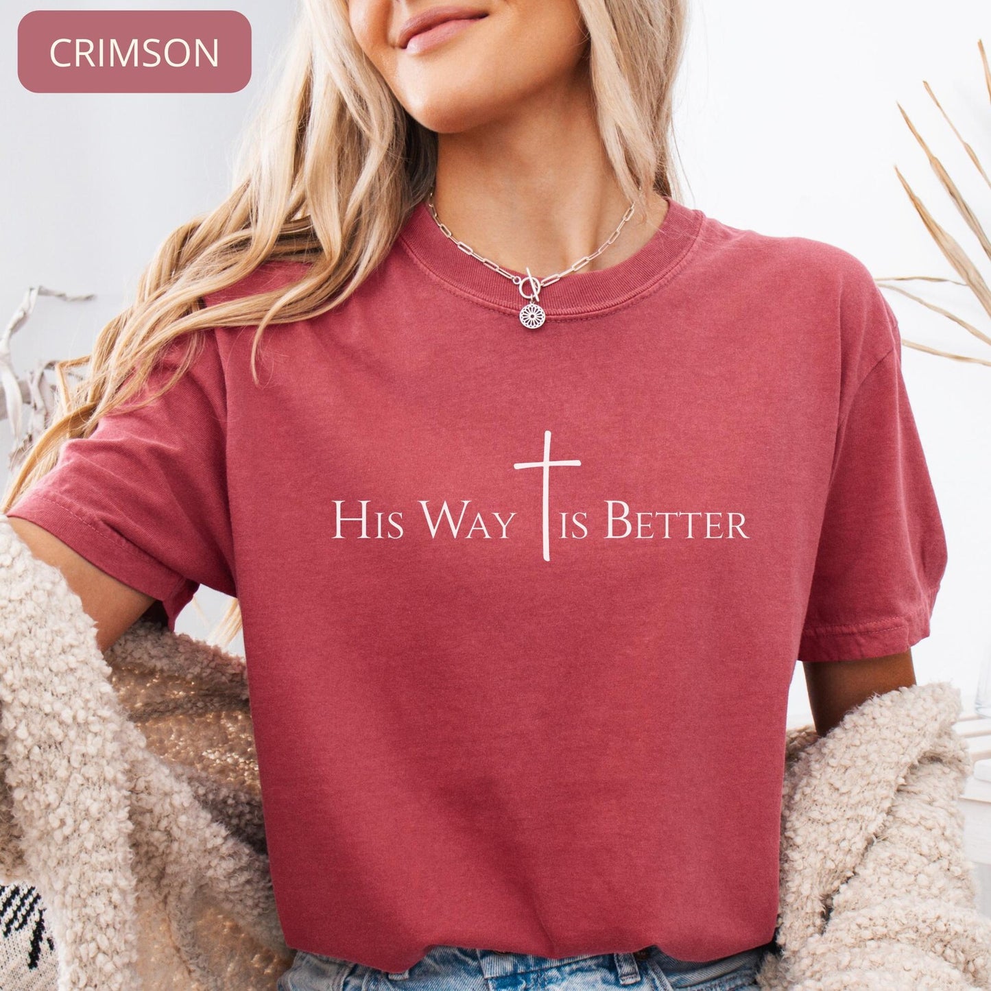 Faith based ivory tee with elegant typography and cross symbol